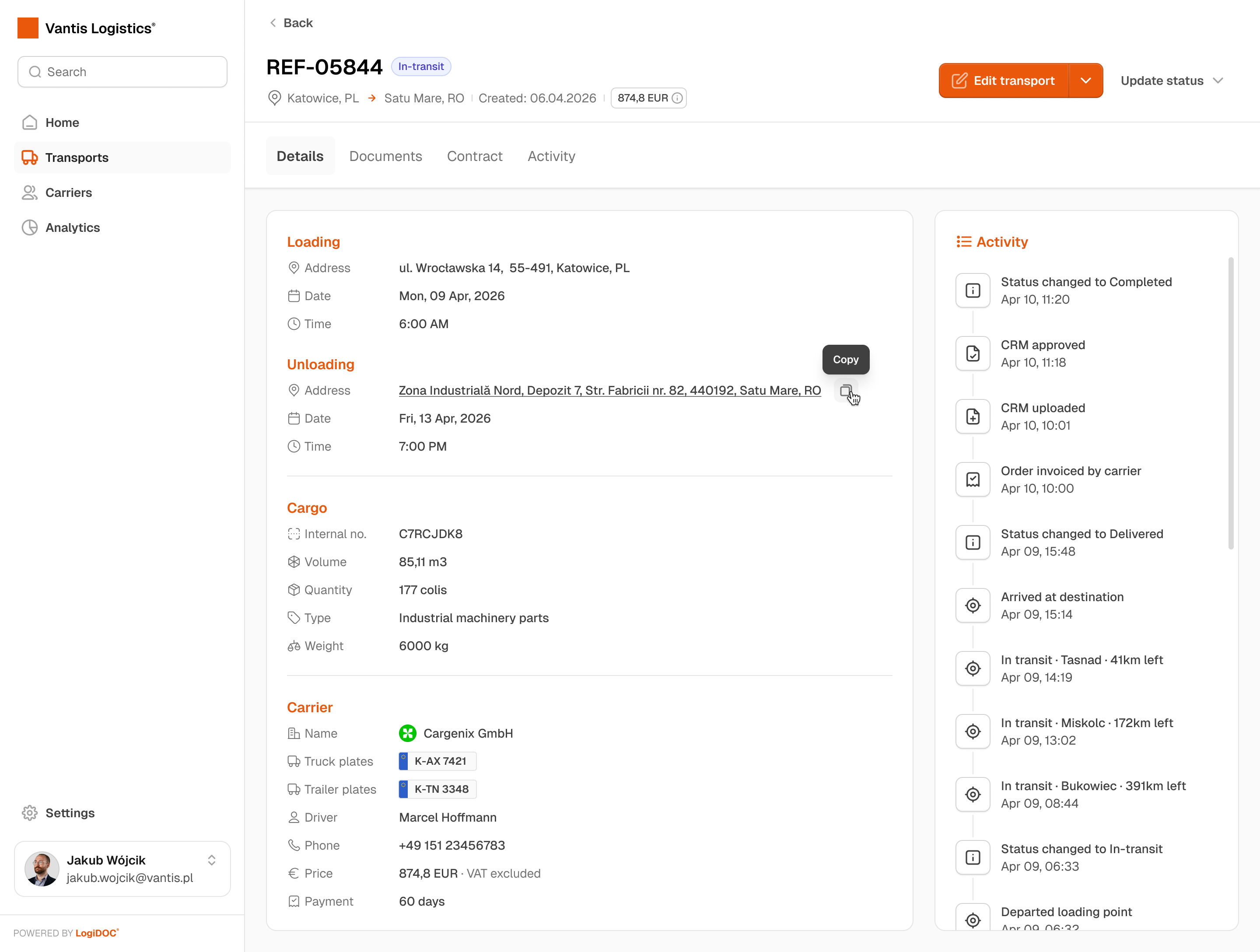 Transport detail page showing loading and unloading addresses, cargo specs, carrier information, and a live activity timeline